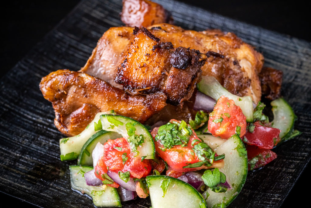 chicken and pork belly adobo, with the cucumber tomato relish