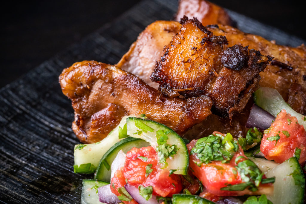 chicken and pork belly adobo, with the cucumber tomato relish