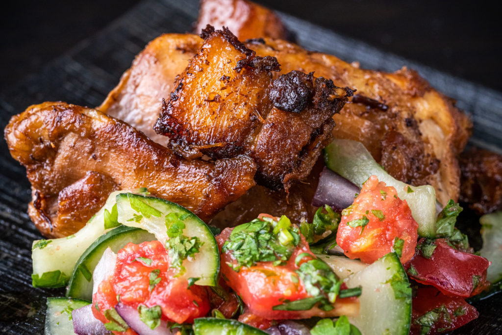 chicken and pork belly adobo, with the cucumber tomato relish