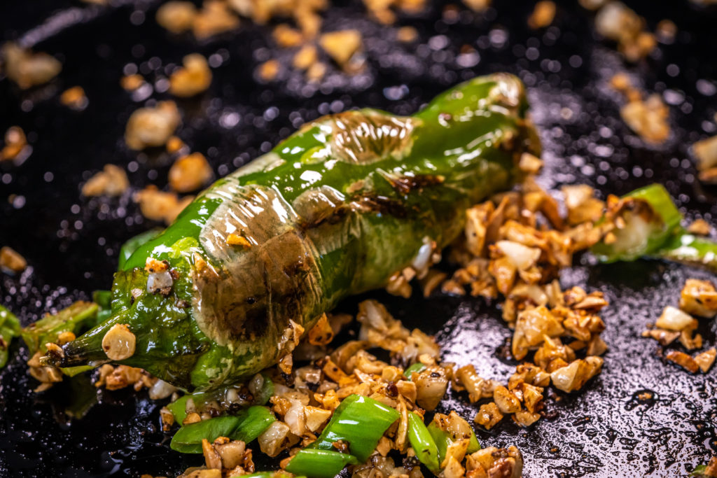 blistered shishitos with garlic