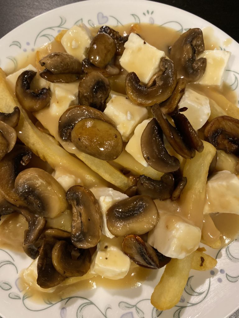 homemade poutine with mushrooms