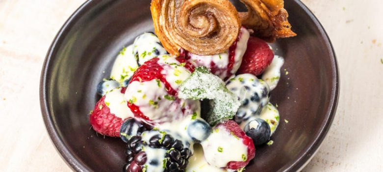 berry salad with candied mint and a puff pastry arlette
