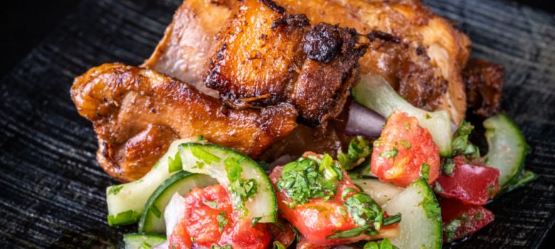 chicken and pork belly adobo, with the cucumber tomato relish