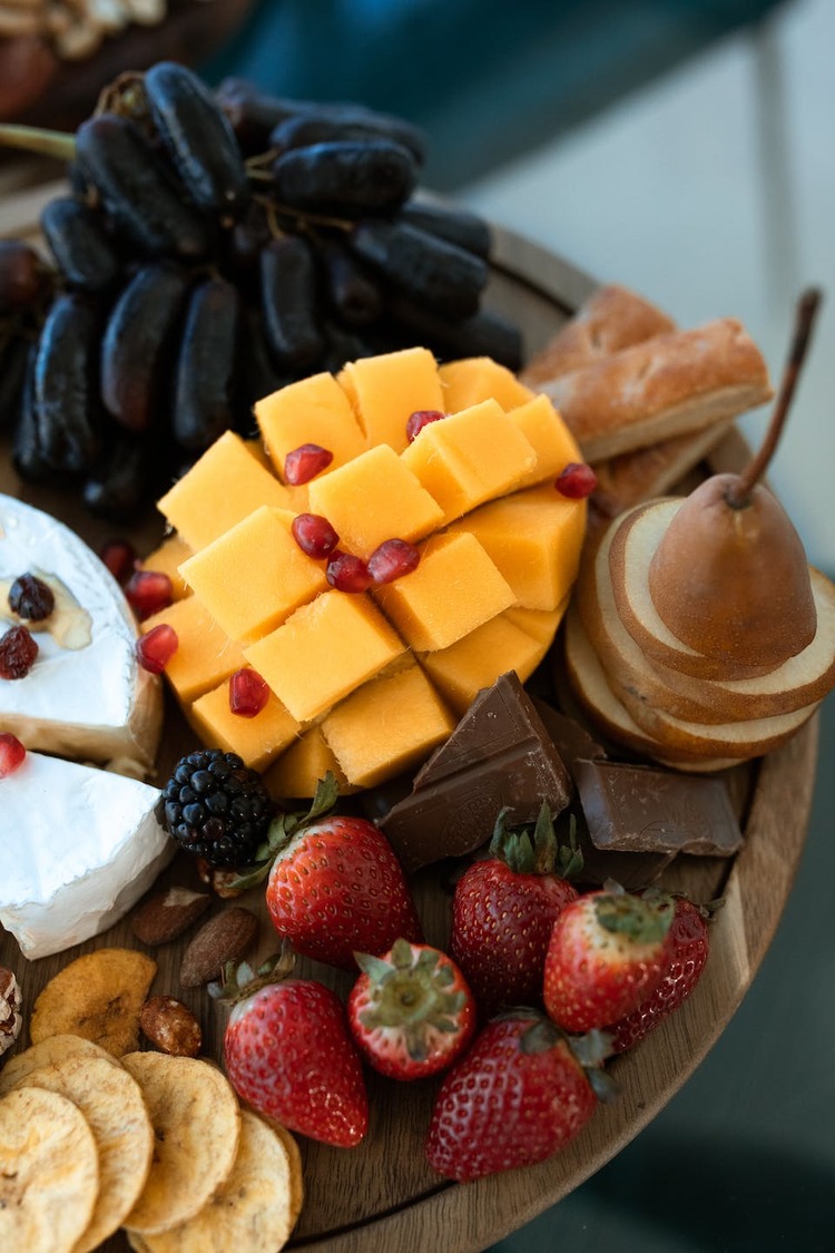 Sliced Pears, Mango, Brie Cheese, Berries and Milk Chocolate Charcuterie Board - Charcuterie Recipe