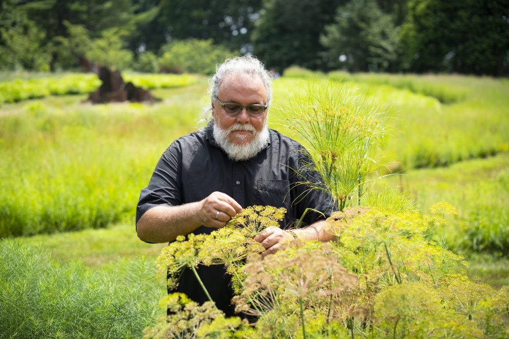 John Forti picking ingredients.